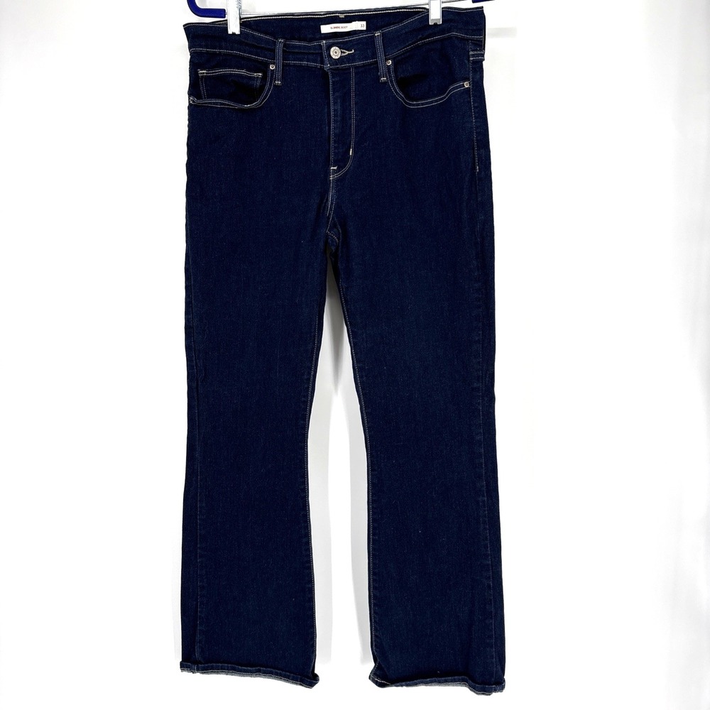 Levis Slimming Boot Cut Jeans Womens 33  Blue Dark Wash Stretch Denim